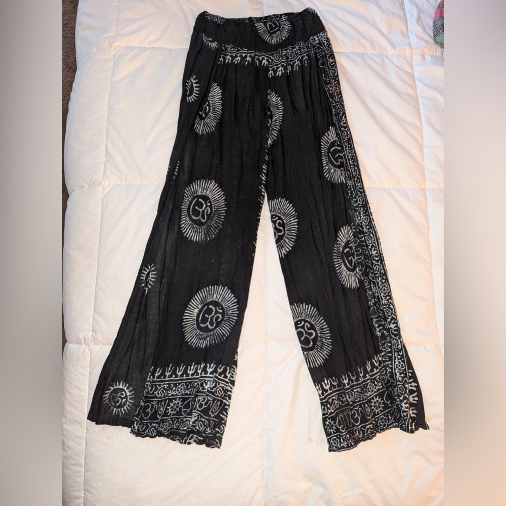 Super cute her waist, a size small earthbound brand pants with slit up  middle